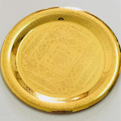 A large round brass